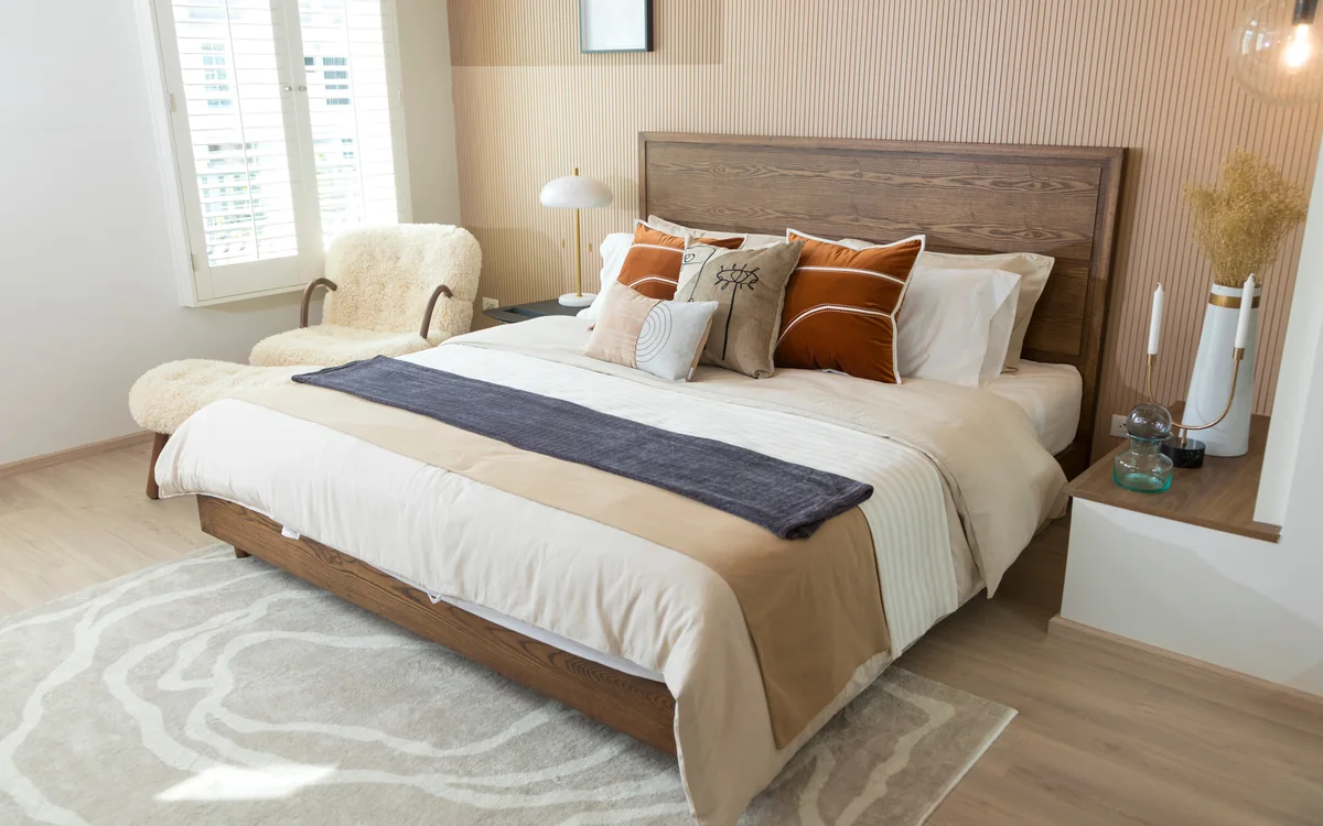 Guest bedroom with the bed made and ready for the next stay