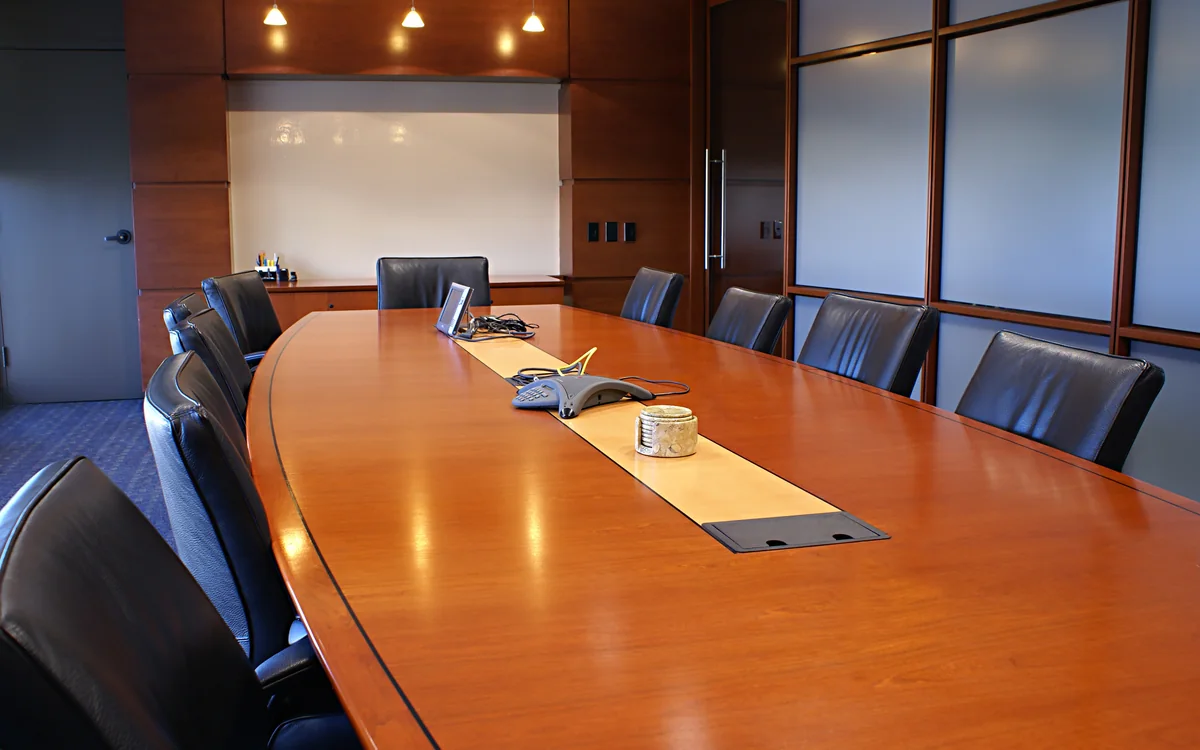 Conference room with a long polished table