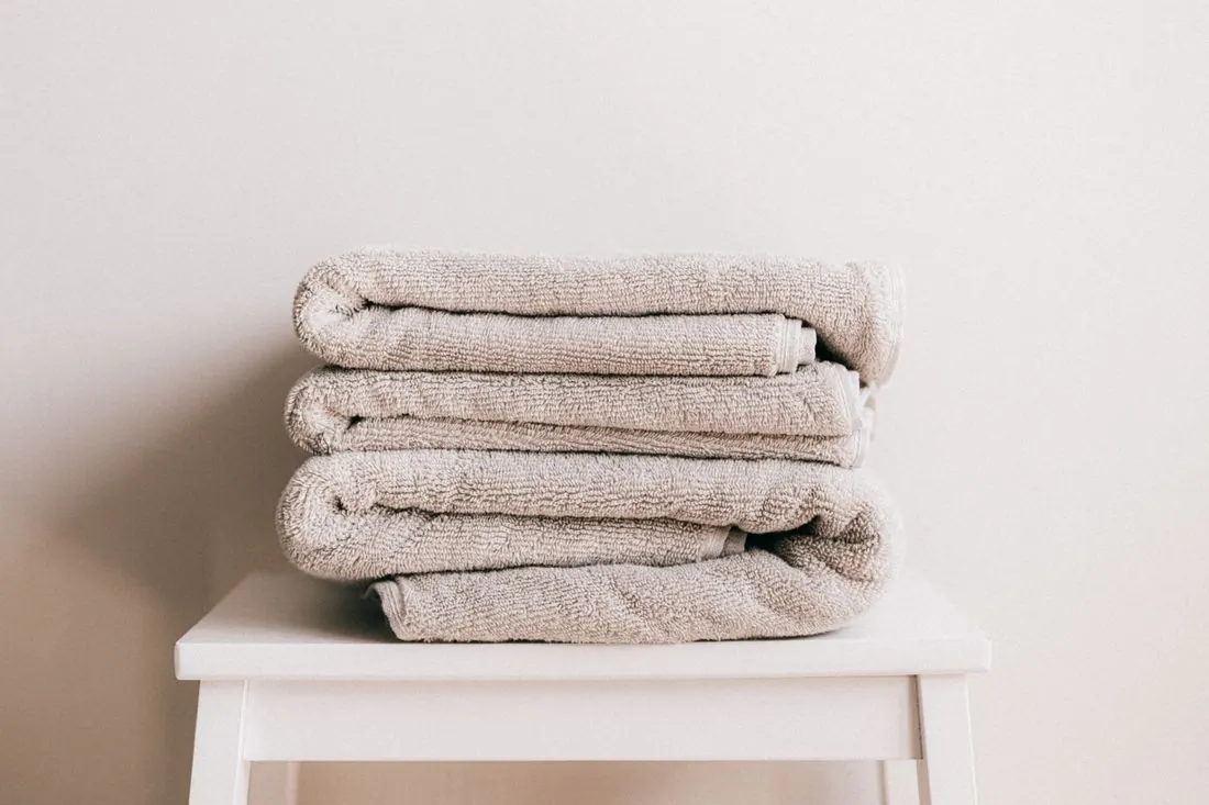 Freshly folded towels left ready in a clean home